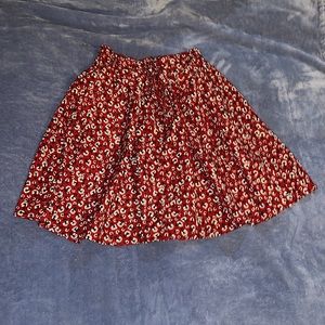 Red skirt with white flowers, adjustable waistband
